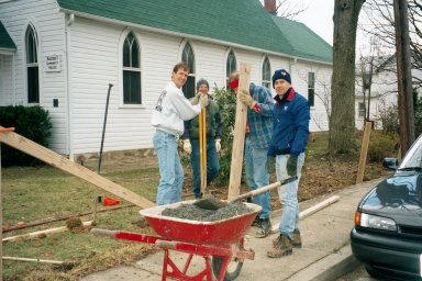 Volunteers led by master craftsman Bruce Atkinson building the BCH picket fence - 2000
